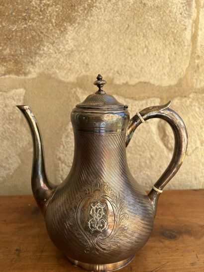 Teapot in silver Minerve mark.

With guilloche...