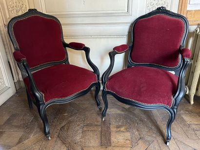 Pair of blackened wood armchairs, molded...