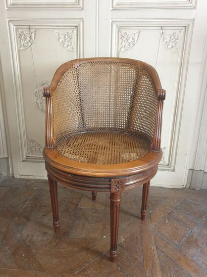 Louis XVI style natural wood desk armchair.

It...