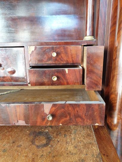 null Mahogany and mahogany veneer secretary of the Empire period

With detached columns

H....