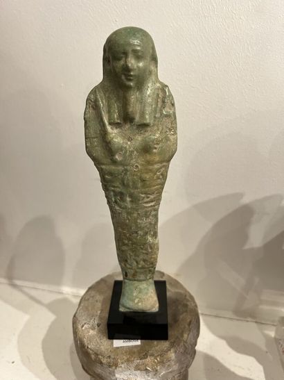 null Egypt, Saite period

Mummiform oushebti, leaning on a dorsal pillar, standing...