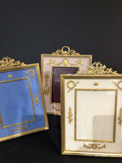 null Three frames 1900

Decorated with garlands and noeds in gilded metal

H.27;...
