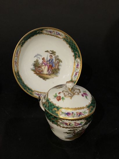 null Meissen

2 porcelain cups and their saucer with polychrome decoration of flowers,...