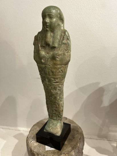 null Egypt, Saite period

Mummiform oushebti, leaning on a dorsal pillar, standing...