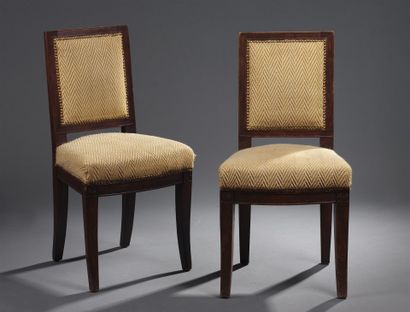 Pair of chairs in natural wood, molded and...