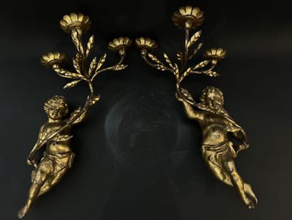 Pair of sconces in carved and gilded wood,...
