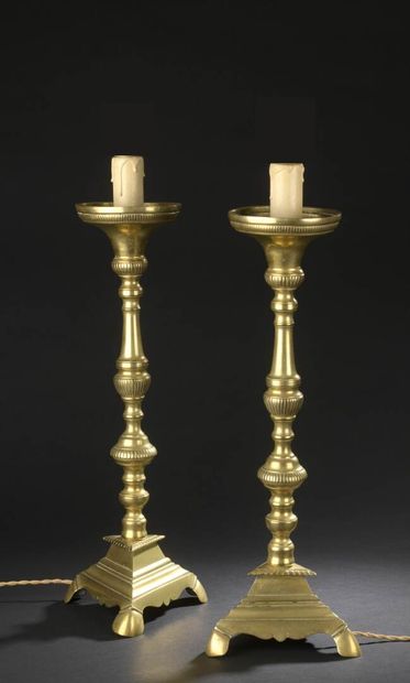 Pair of turned brass candelabras, 18th century...