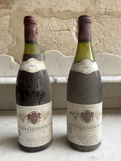 null 2 bottles MAZIS CHAMBERTIN 

1985 Dupont Tisserandot 

1 low level 



Place...