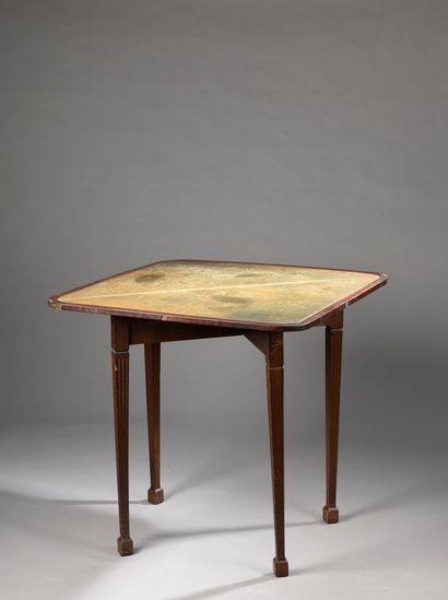 null Mahogany and mahogany veneer folding game table, late Louis XVI period
Fully...