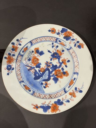 null CHINA, 18th century
Five porcelain plates with blue, red and gold Imari decoration...