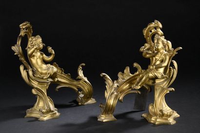 null Paire de chenets en bronze ciselé et doré d'époque Louis XV
À décor d'enfants...
