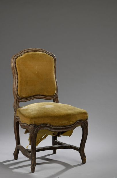 null Molded wood chair probably stamped C.F. NORMAND of Louis XV period.
The curved...
