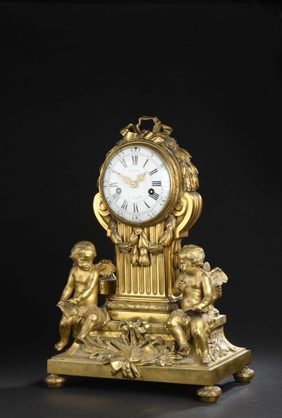 null Transitional period chased and gilt bronze clock by Osmond.
The dial and the...