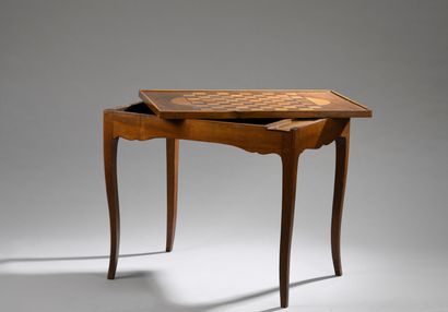 null Walnut veneered game table stamped Hache Fils in Grenoble, Louis XV period.
The...