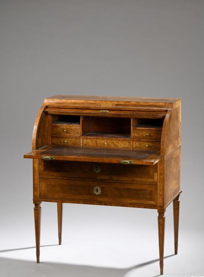 Louis XVI period walnut veneer cylinder desk
Decorated...