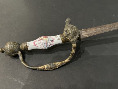 Sword with page ring. Earthenware rocket,...