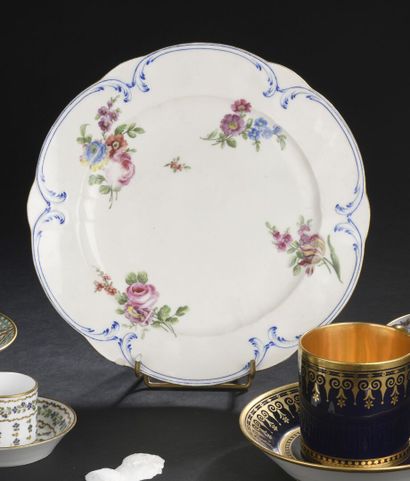 null SÈVRES, 18th century, 1769
Plate with palms in soft porcelain with polychrome...