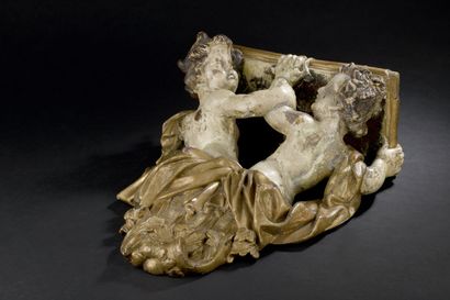Louis XIV period carved and gilded wood console
Decorated...