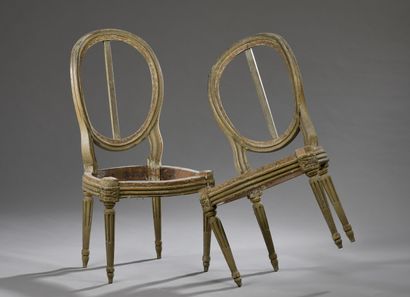 Pair of Louis XVI period carved molded wood...