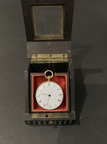 Gold watch circa 1850 
On the back a coat...