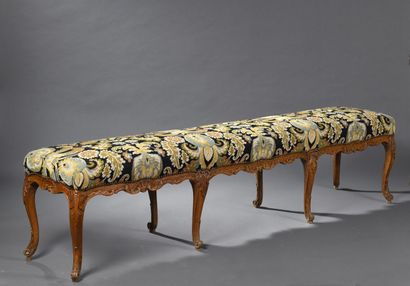 Carved wood bench from the early Louis XV...