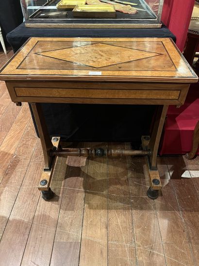 A burr and mahogany veneered work table with...