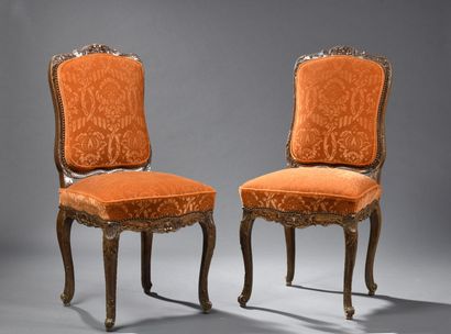 Pair of large carved wood chairs from the...