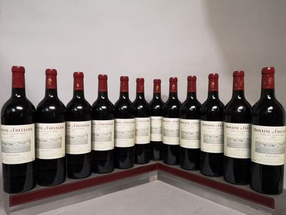 null 12 bouteilles DOMAINE de CHEVALIER - Gc Pessac Leognan 2004				
En caisse b...