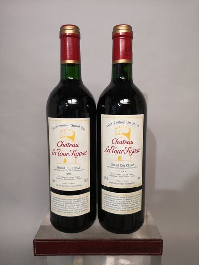 null 2 bouteilles Château LA TOUR FIGEAC - Gcc Saint Emilion 1995	
1 niveau base...