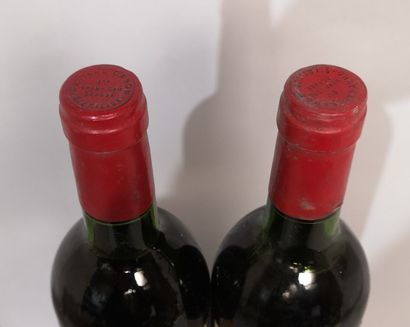 null 2 bouteilles Château CANON - 1er Gcc Saint Emilion	1982	Etiquettes légèrement...