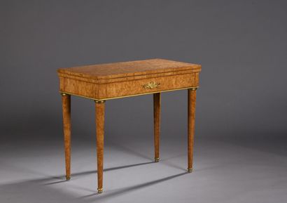 null Charles X period ash veneer game table.
The tray opens, it rests on sheath feet...