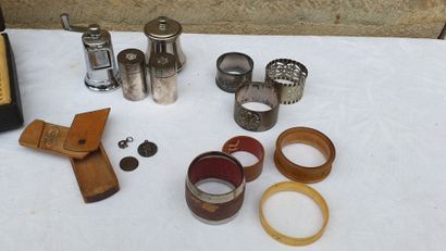 null Lot of napkin rings, salt and pepper shakers, medals and various.
A case for...