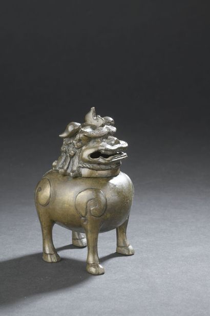 null TWO BRUSHES in bronze
CHINA, 20th century
One in the form of a bird perched...