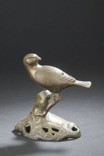 null TWO BRUSHES in bronze
CHINA, 20th century
One in the form of a bird perched...