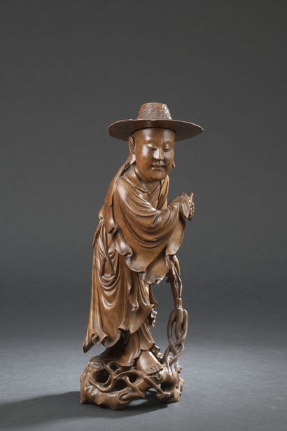 null STATUETTE D'IMMORTEL en bois sculpté
JAPON, début du XXe siècle
Représenté debout...