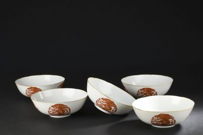 null FOUR BOWLS in red iron porcelain
CHINA, late Qing dynasty (1644- 1911)
Hemispherical,...