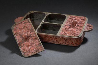 null Carved red lacquer box
CHINA, early 20th century
Comprising the top with two...