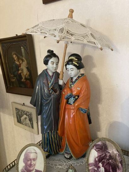 JAPON, circa 1920/1930. Couple JAPAN, circa 1920/1930
Enameled stoneware COUPLE standing,...