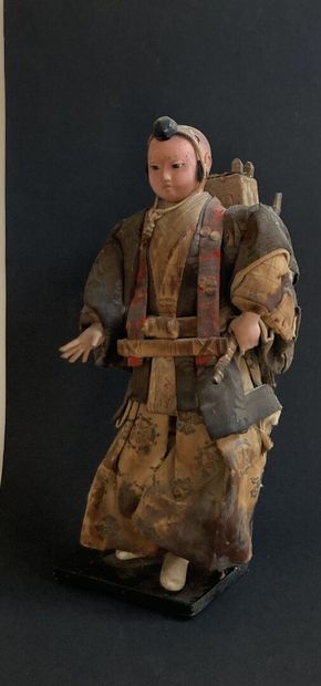 JAPON - XIXe siècle JAPAN - 19th century :
Doll representing a young samurai dressed...