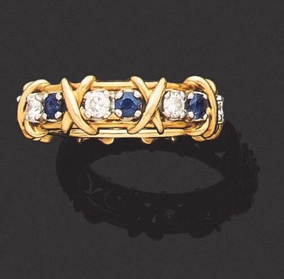 null TIFFANY & Co - SCHLUMBERGER - ALLIANCE set with alternating round sapphires...