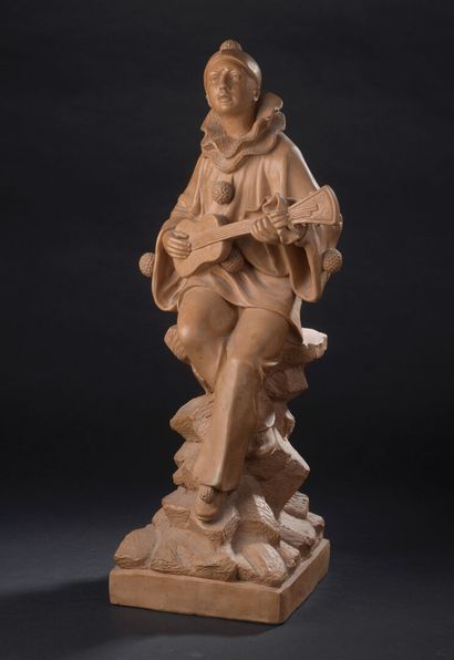 Sèvres
Grande figure d'Arlequin en grès rouge.
Cachet...