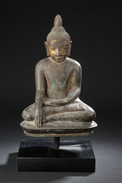 Statuette de bouddha en bronze
Traces de...