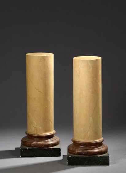 Pair of patinated plaster columns resting...