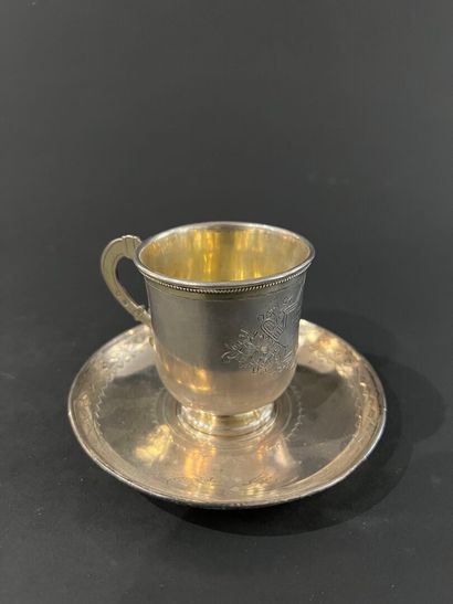 null RUSSIA - Silver cup and saucer 84 zolotniks (875 thousandths), chased and engraved...
