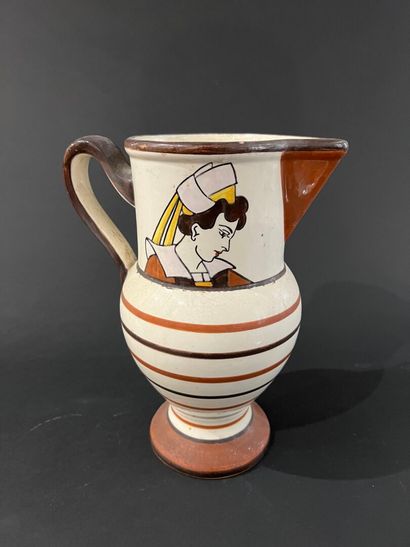 null HB Quimper
Earthenware pitcher decorated with Breton busts H.25cm
Two cups and...