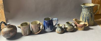 null GREBER Charles (1853-1935)
Set of eight stoneware pitchers with polychrome enamel...