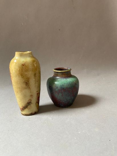 null LACHENAL Edmond (1855-1948)
Two ovoid and conical stoneware vases with polychrome...