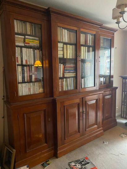 null Mahogany and mahogany veneer bookcase
The projecting front opens to four glass...
