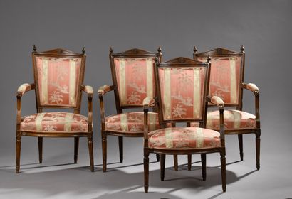 null Suite of four Louis XVI period molded and carved wood armchairs.
With trapezoidal...