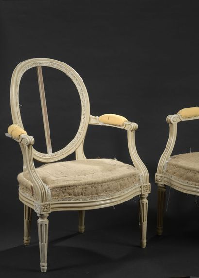 null Louis XVI period armchair in molded, carved and white lacquered wood, stamped...